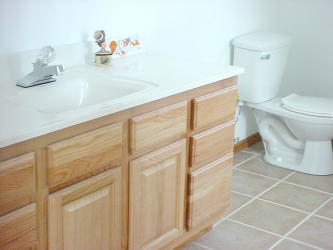 Master bathroom sink and stool