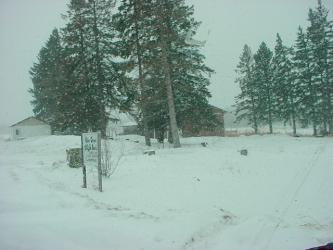Snowy View of Multi-Use Building and Pole Building